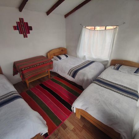 Inti Wasi Lodge Comunidad Yumani Bagian luar foto
